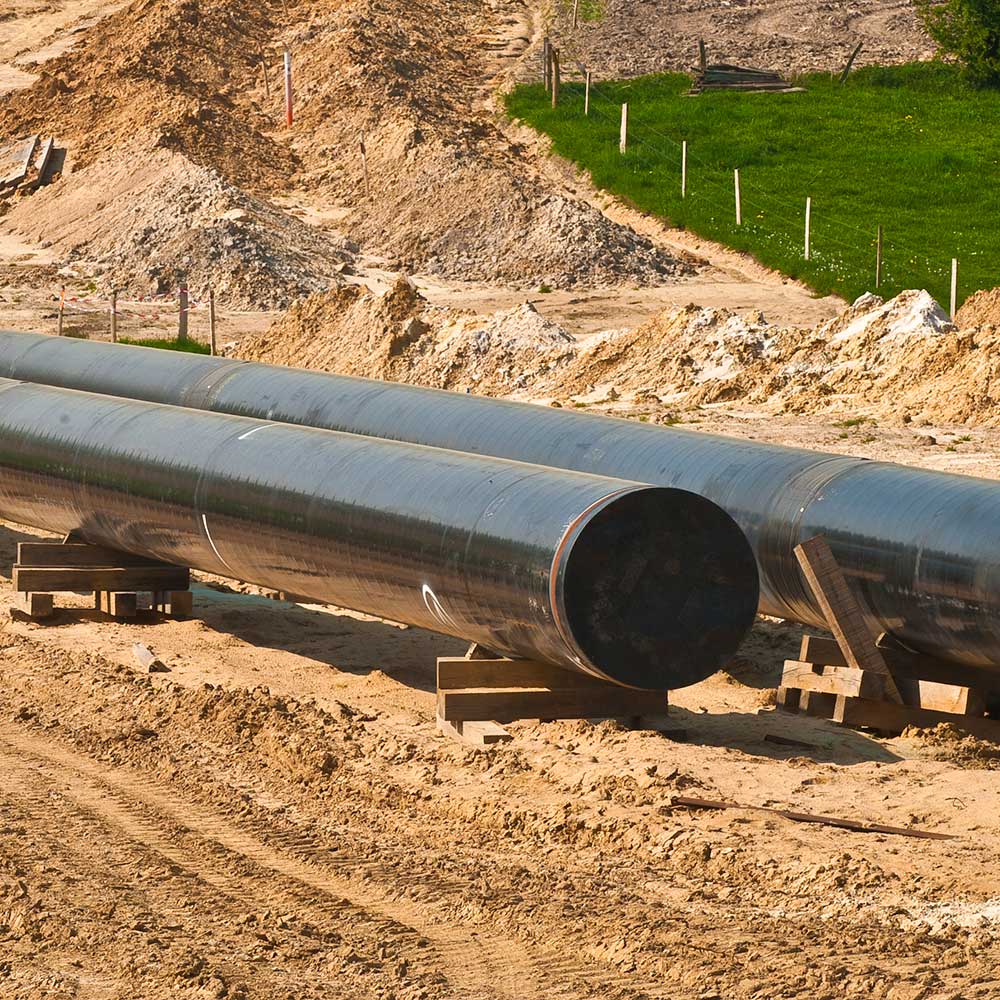 midstream oil & gas land services - pipeline being built